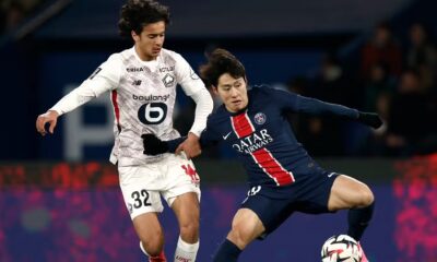 Lille's Ayyoub Bouaddi in action with Paris St Germain's Lee Kang-in