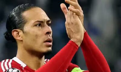 Liverpool's Virgil van Dijk applauds fans after the match