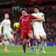 LIVERPOOL, ENGLAND - JANUARY 01: Federico Chiesa of Liverpool is challenged by Pascal Struijk of Leeds United during the Premier League match between Liverpool and Leeds United at Anfield on January 01, 2026 in Liverpool, England. (Photo by Jan Kruger/Getty Images)