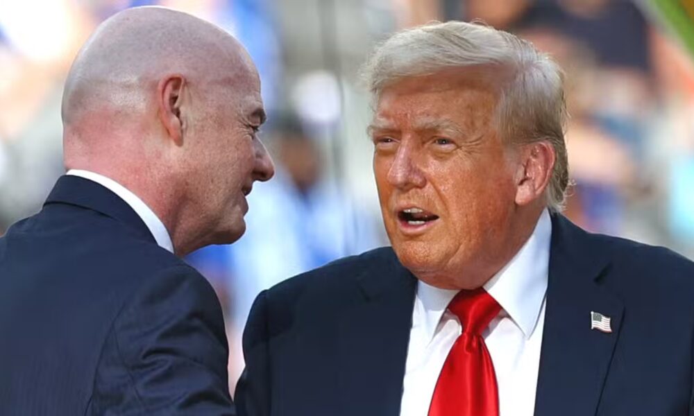 President Donald Trump shakes hands with FIFA president Gianni Infantino