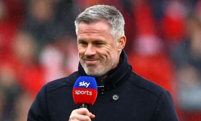 TV Pundit and former player Jamie Carragher is pictured smiling at Anfield