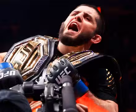 Islam Makhachev celebrates at UFC 322