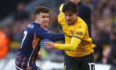 Wolverhampton Wanderers left-back Hugo Bueno breaks away from Nottingham Forest right-back Neco Williams