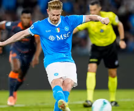 Napoli's Kevin De Bruyne scores their first goal from the penalty spot
