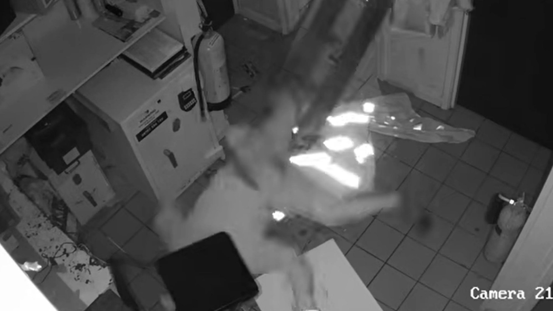 Chaotic moment world's clumsiest burglar falls FOUR times from ceiling while trying to flee robbery at petrol station