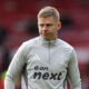 Oleksandr Zinchenko of Nottingham Forest warms up ahead of the Premier League match between Nottingham Forest and Manchester City at City Ground on...