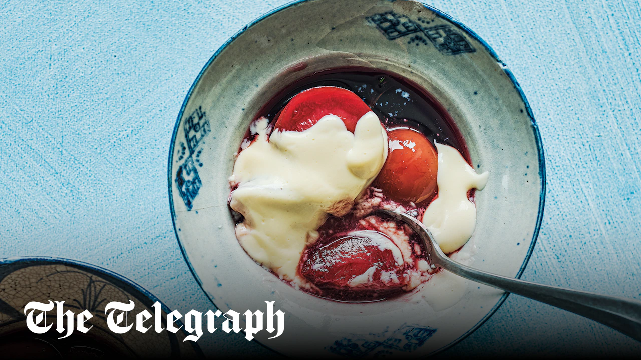 Mulled plums with custard