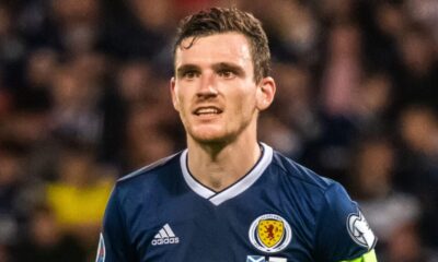 Andy Robertson playing football for Scotland