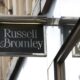 Next buys Russell & Bromley out of administration as 33 shops face uncertainty