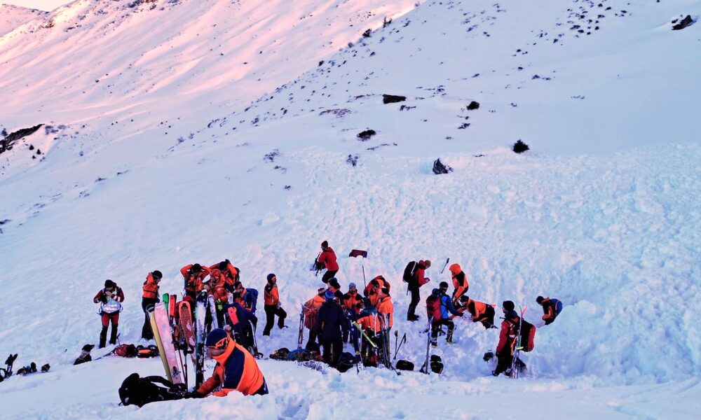 Rescuers search for people after an avalanche in the Salzburg Pongau region of western Austria. Pic: AP