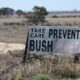 A sign promoting bushfire awareness lines the road near Wongan Hills, Australia. Pic: Reuters