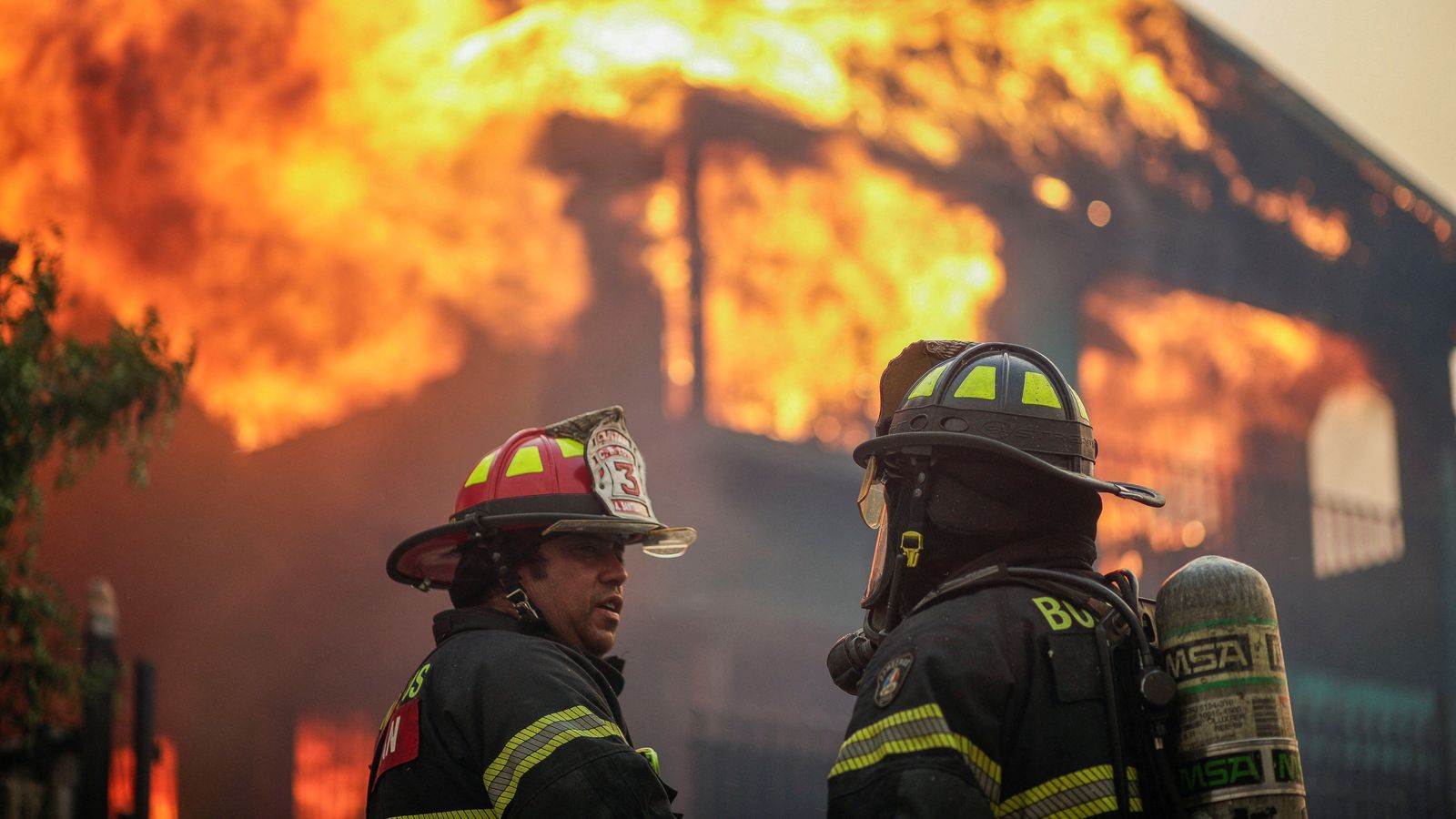 Firefighters during the wildfire that prompted emergency evacuations in Chile. Pic: Reuters