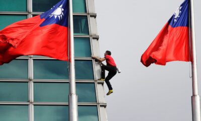 Alex Honnold during his climb of the Taipei 101 skyscraper. Pic: AP