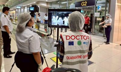 Health authorities wearing protective clothing at Suvarnabhumi International Airport in Bangkok. Pic: Reuters