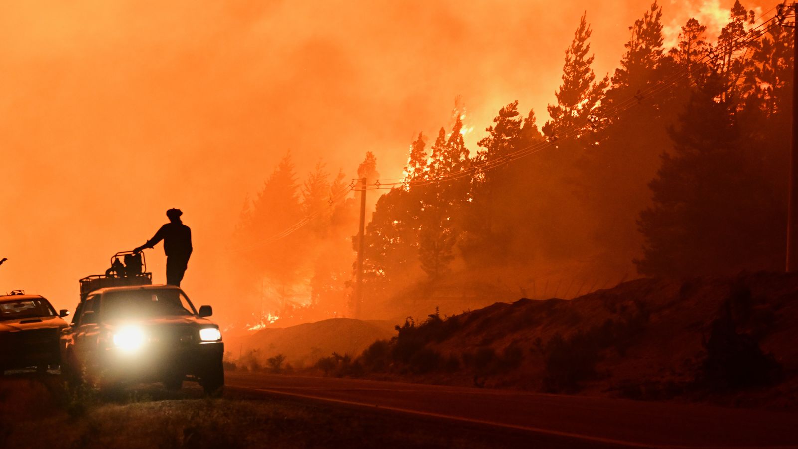 Firefighters in El Hoyo, Patagonia, Argentina. Pic: AP