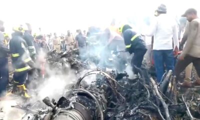 The aircraft crashed in an open field in western India. Pic: ANI/Reuters