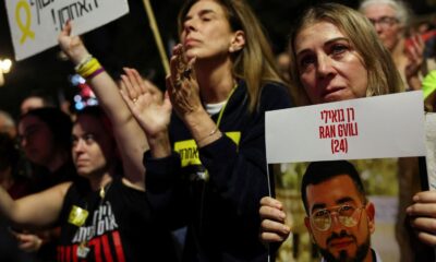 A picture of hostage Ran Gvili is held up during a rally in Tel Aviv last November. Pic: Reuters