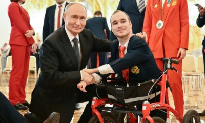 Vladimir Putin, the Russian president, with two-time Paralympic silver medallist swimmer Vladimir Danilenko in 2024. File pic: Reuters