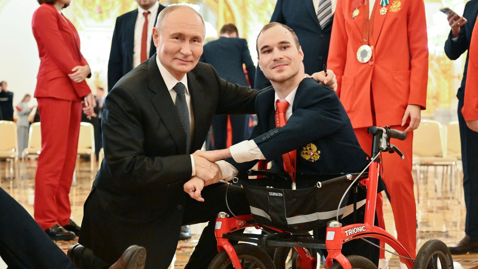 Vladimir Putin, the Russian president, with two-time Paralympic silver medallist swimmer Vladimir Danilenko in 2024. File pic: Reuters