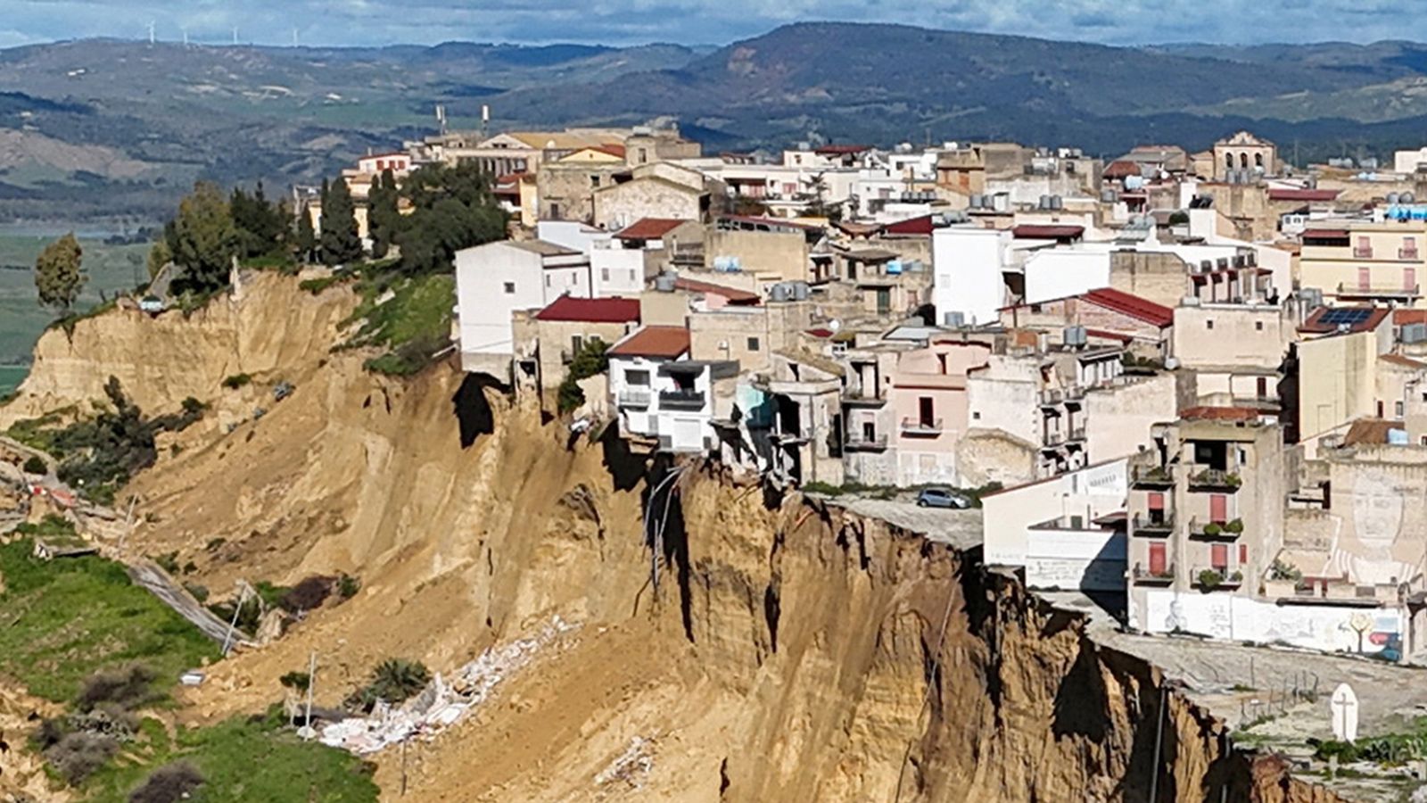 'The entire hill is collapsing': Landslide in Sicily causes homes to fall off cliff edge, 1,500 evacuated | World News
