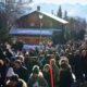 Hundreds of people walked in silence to the site of the tragedy in the Swiss ski resort of Crans-Montana. Pic: AP