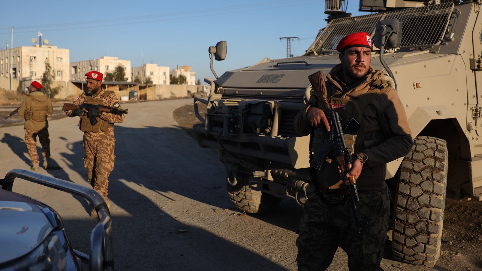 Syrian government forces outside Al-Aqtan prison near Raqqa. Pic: AP