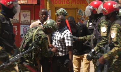 'People power' opposition supporters shout as voting count in Uganda election turns violent | World News