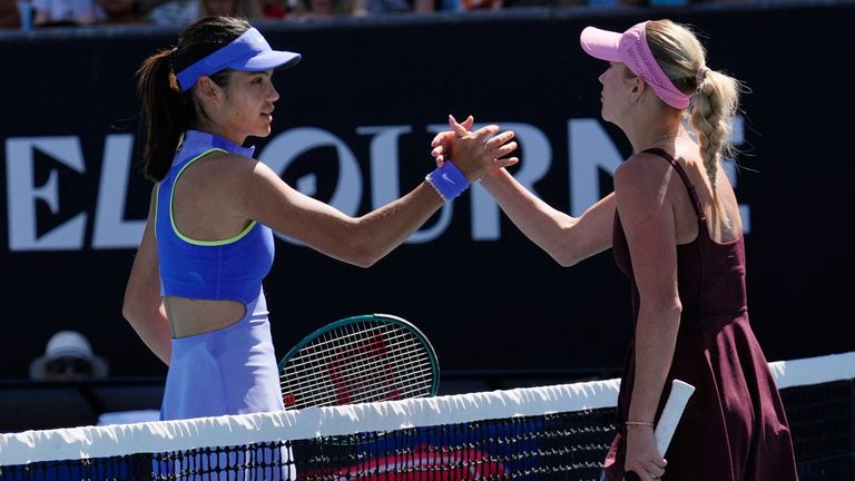 Anastasia Potapova of Austria is congratulated by Emma Raducanu, left, of Britain following their second round match at the Australian Open