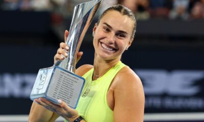 Aryna Sabalenka poses with the trophy after winning the 2026 Brisbane International