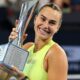 Aryna Sabalenka poses with the trophy after winning the 2026 Brisbane International