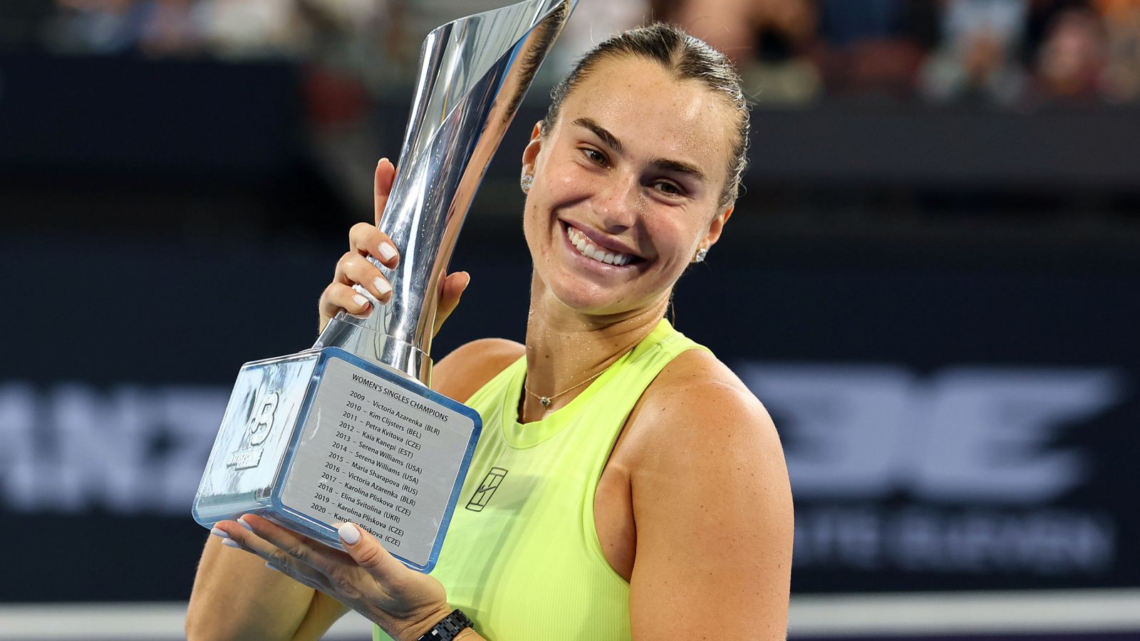 Aryna Sabalenka poses with the trophy after winning the 2026 Brisbane International