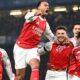 Ben White (second from right) celebrates with team-mates after giving Arsenal an early lead against Chelsea in the Carabao Cup semi-final