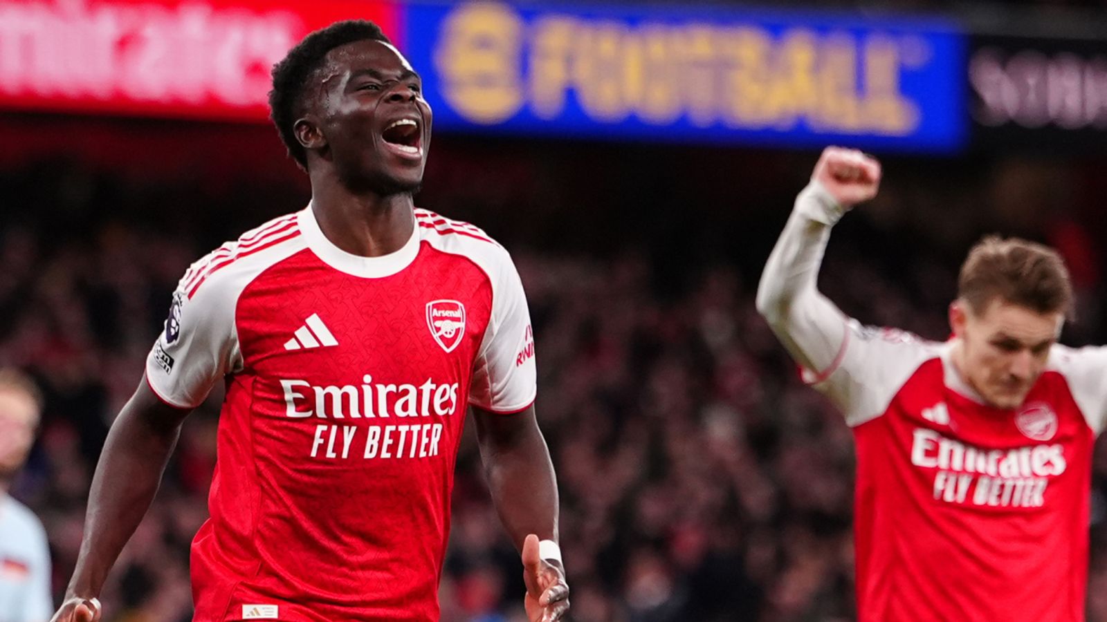 Arsenal's Bukayo Saka celebrates after scoring his sides second goal