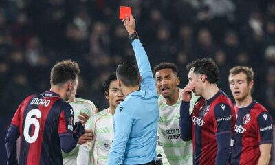 BOLOGNA, ITALY - JANUARY 22: Celtic's Reo Hatate fouls Bologna's Juan Miranda and receives his second yellow card and a red card during a UEFA Europa League 2025/26 League Phase MD7 match between Bologna and Celtic at Stadio Renato Dall'Ara, on January 22, 2026, in Bologna, Italy. (Photo by Craig Williamson / SNS Group)