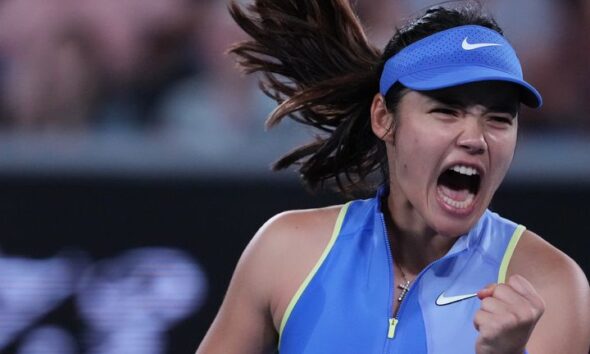 Emma Raducanu of Britain reacts after winning a point against Mananchaya Sawangkaew of Thailand during their first round match at the Austra