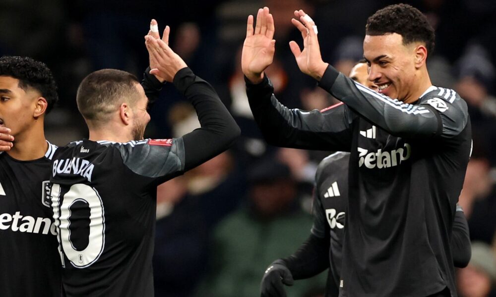 Morgan Rogers celebrates with Emi Buendia after scoring Aston Villa's second goal at Spurs