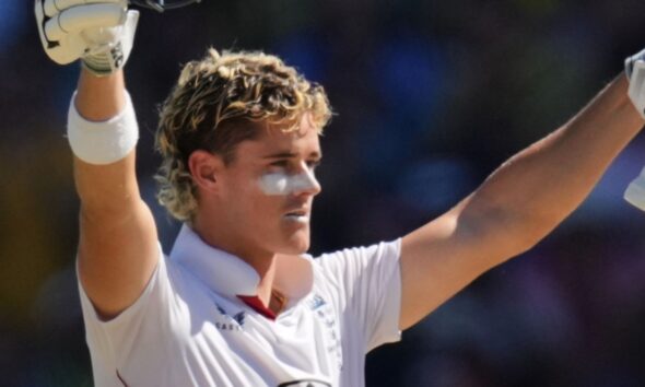 England's Jacob Bethell celebrates after scoring a century during play on day four of the fifth and final Ashes cricket test between England and Australia in Sydney, Wednesday, Jan. 7, 2026. (AP Photo/Mark Baker)