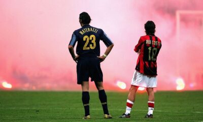 Marco Materazzi of Inter Milan and Rui Costa of AC Milan look on during the Champions League quarter-final second leg at San Siro in 2005