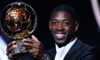 Paris Saint-Germain's French forward Ousmane Dembele reacts receiving the Ballon d'Or award during the 2025 Ballon d'Or France Football award ceremony at the Theatre du Chatelet in Paris on September 22, 2025. (Photo by Franck FIFE / AFP)