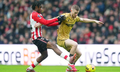 Sunderland's Romaine Mundle and Crystal Palace's Adam Wharton battle for the ball during the Premier League match at the Stadium of Light,...