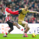 Sunderland's Romaine Mundle and Crystal Palace's Adam Wharton battle for the ball during the Premier League match at the Stadium of Light,...