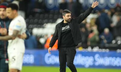 Swansea City Head Coach Vitor Matos waves to the home fans