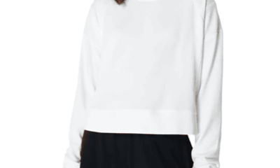 white sweatshirt with thumb holes