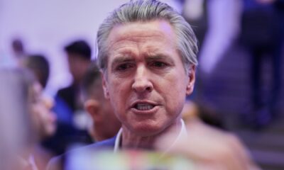 Trump’s threats over Greenland draw warnings and profanities at global forum