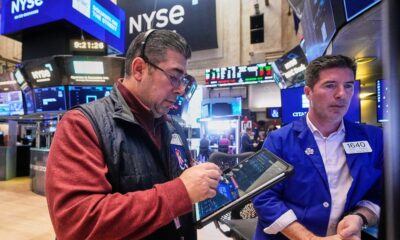 US stocks rise as gold hits another record and the dollar's value sinks