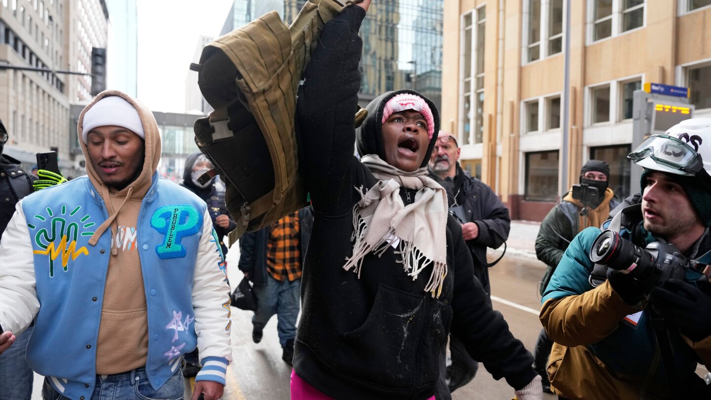 Protesters for and against the Minneapolis immigration crackdown face off
