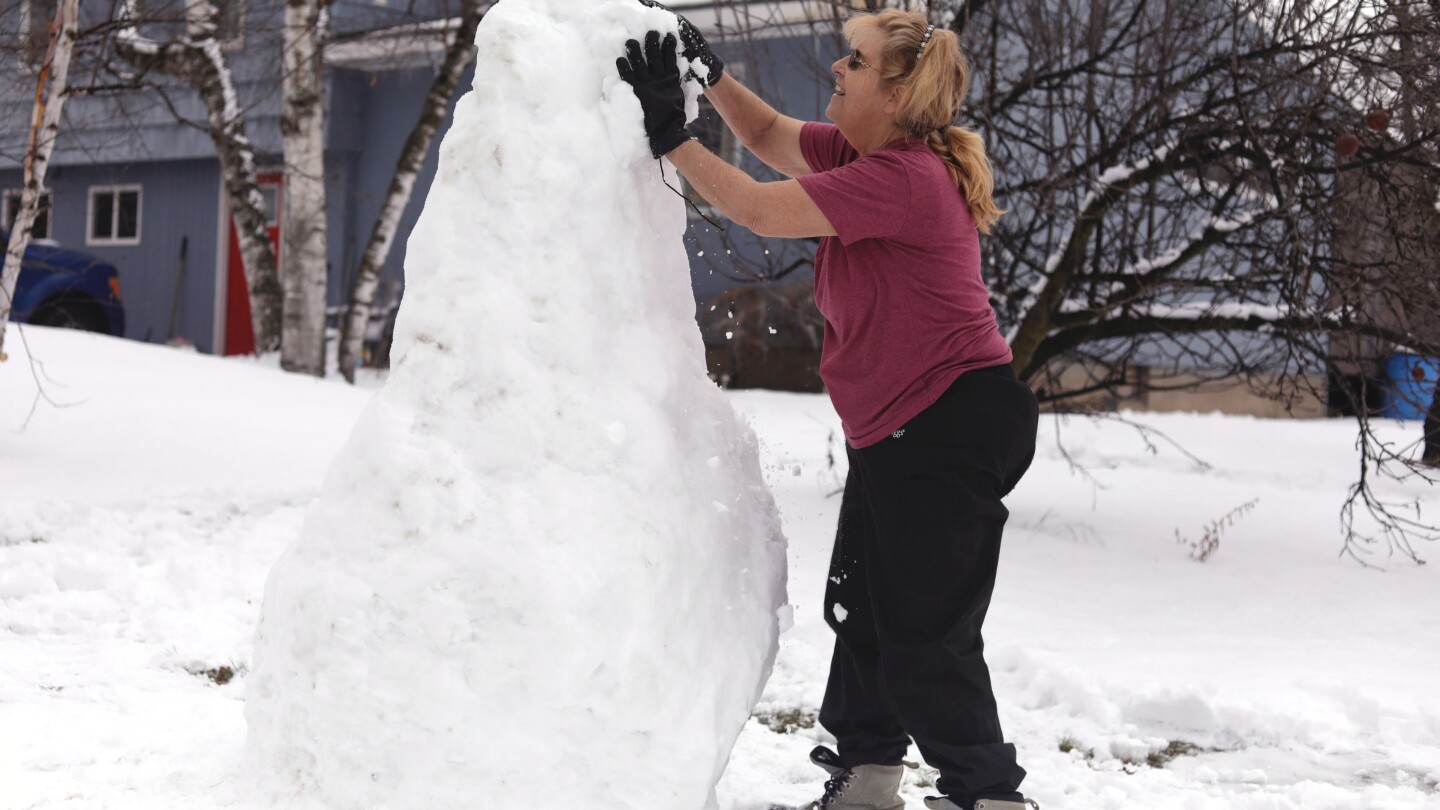 New England school cancellations rise amid ice and snowstorm
