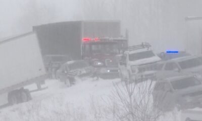 Michigan authorities cleaning up 100-car pileup as snow moves across country