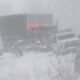 Michigan authorities cleaning up 100-car pileup as snow moves across country