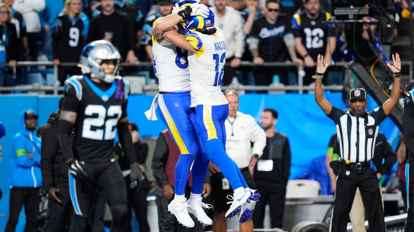 Stafford's late TD pass to Parkinson lifts the Rams past the Panthers 34-31